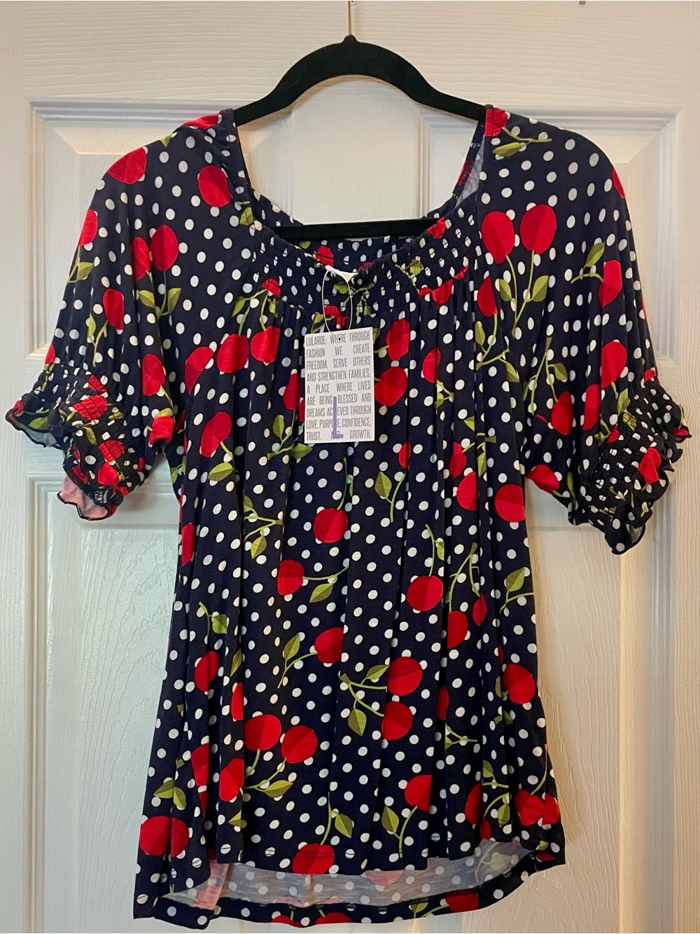 LuLaRoe Navy Polka Dot Top with Red Cherry Print